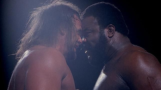Macho Man Randy Savage faces off against Junk Yard Dog at the Wrestling Classic.